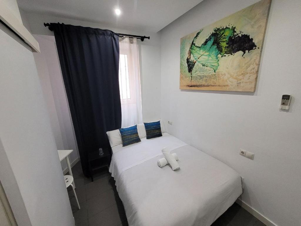 Posteľ alebo postele v izbe v ubytovaní AYZ Frailes - Auto check-in property