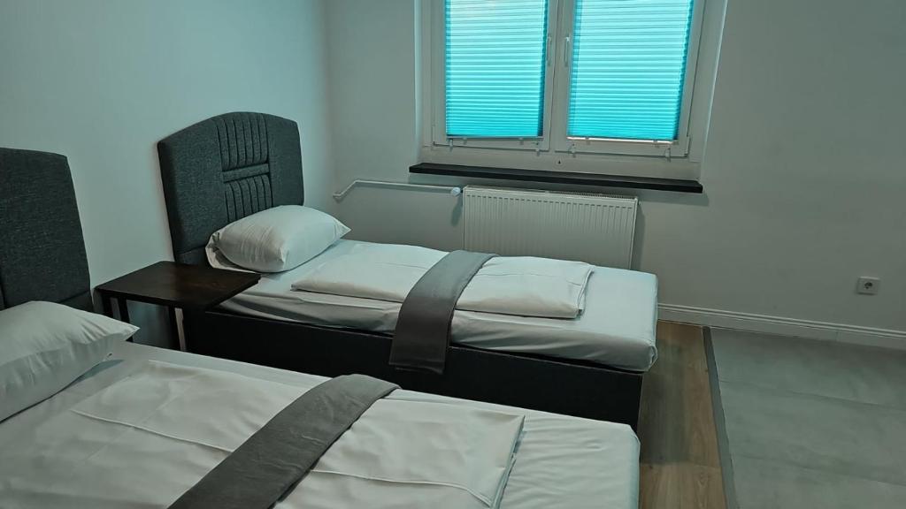 Postel nebo postele na pokoji v ubytování Hotel Delisa