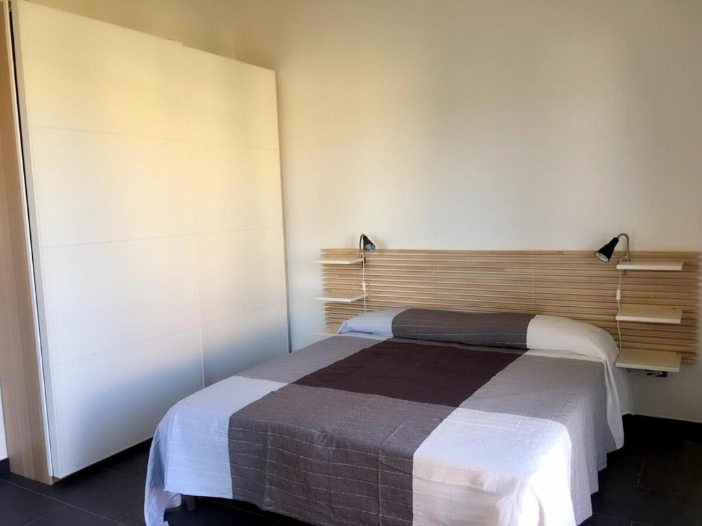 Letto o letti in una camera di Brezza di Levante