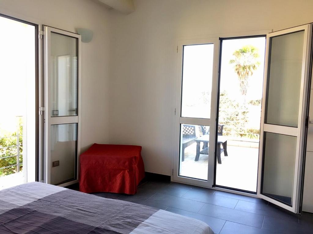 Letto o letti in una camera di Brezza di Levante