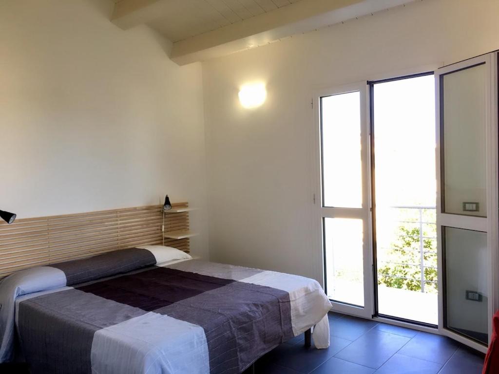 Letto o letti in una camera di Brezza di Levante