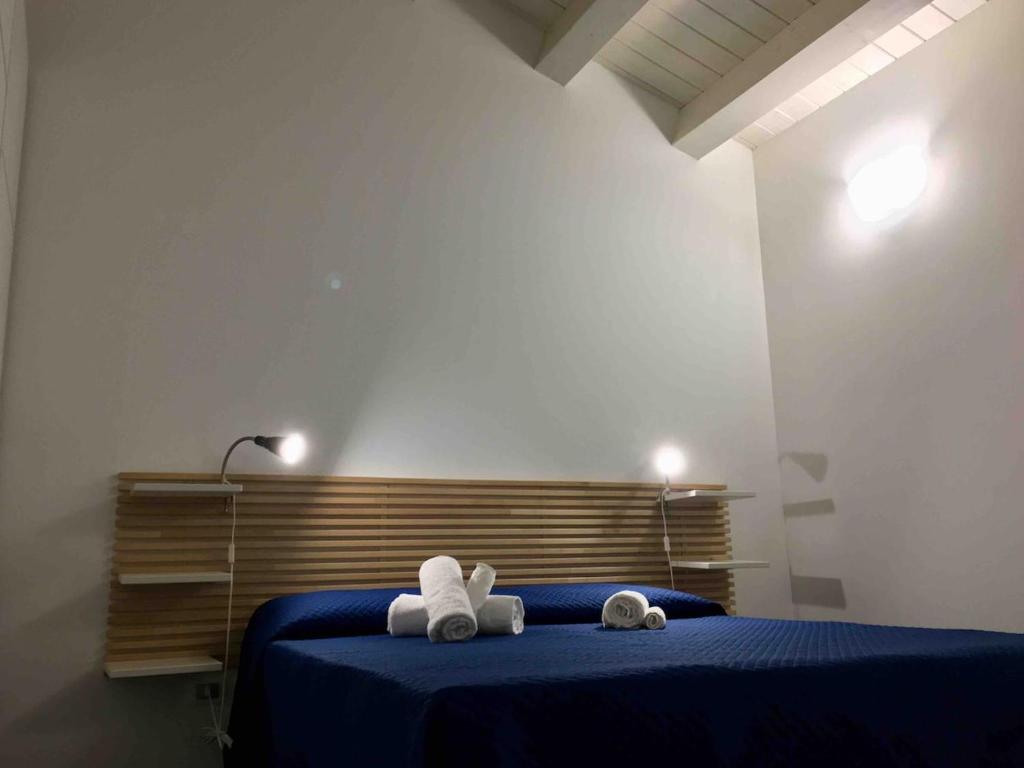 Letto o letti in una camera di Brezza di Levante