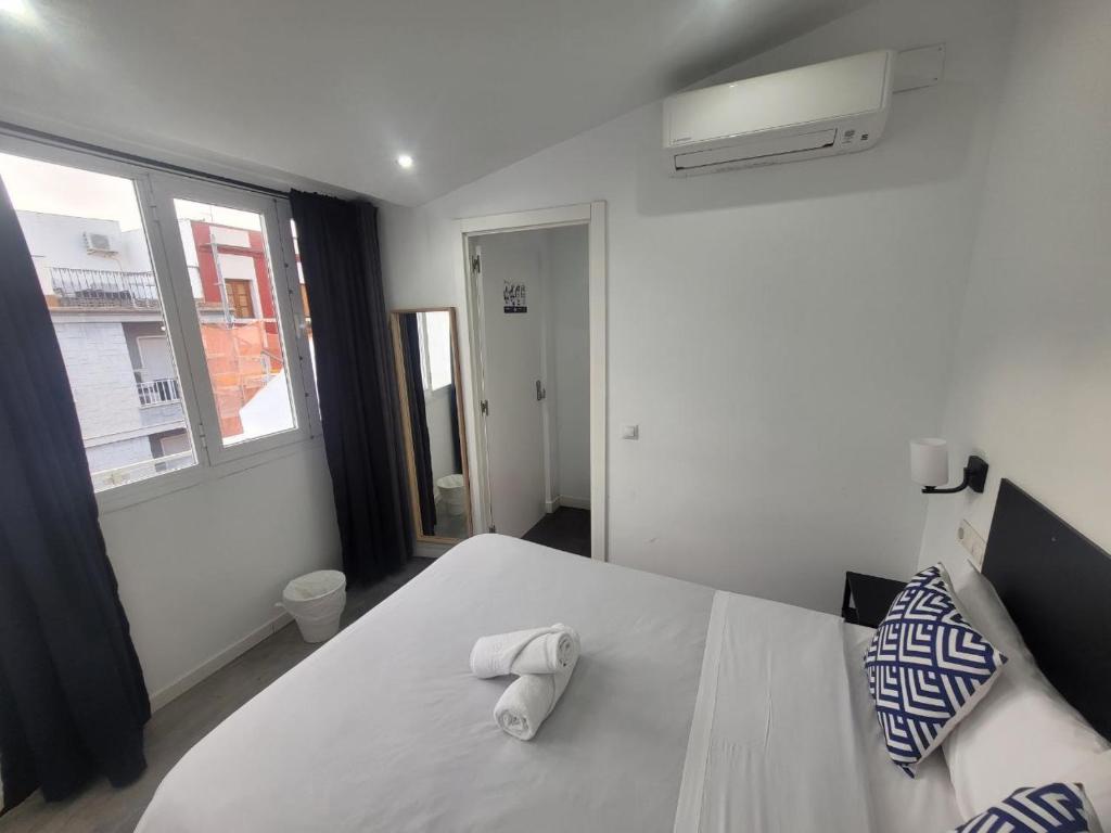 Posteľ alebo postele v izbe v ubytovaní AYZ Frailes - Auto check-in property