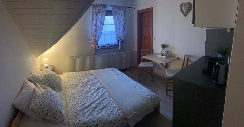 Postel nebo postele na pokoji v ubytování Apartmany215
