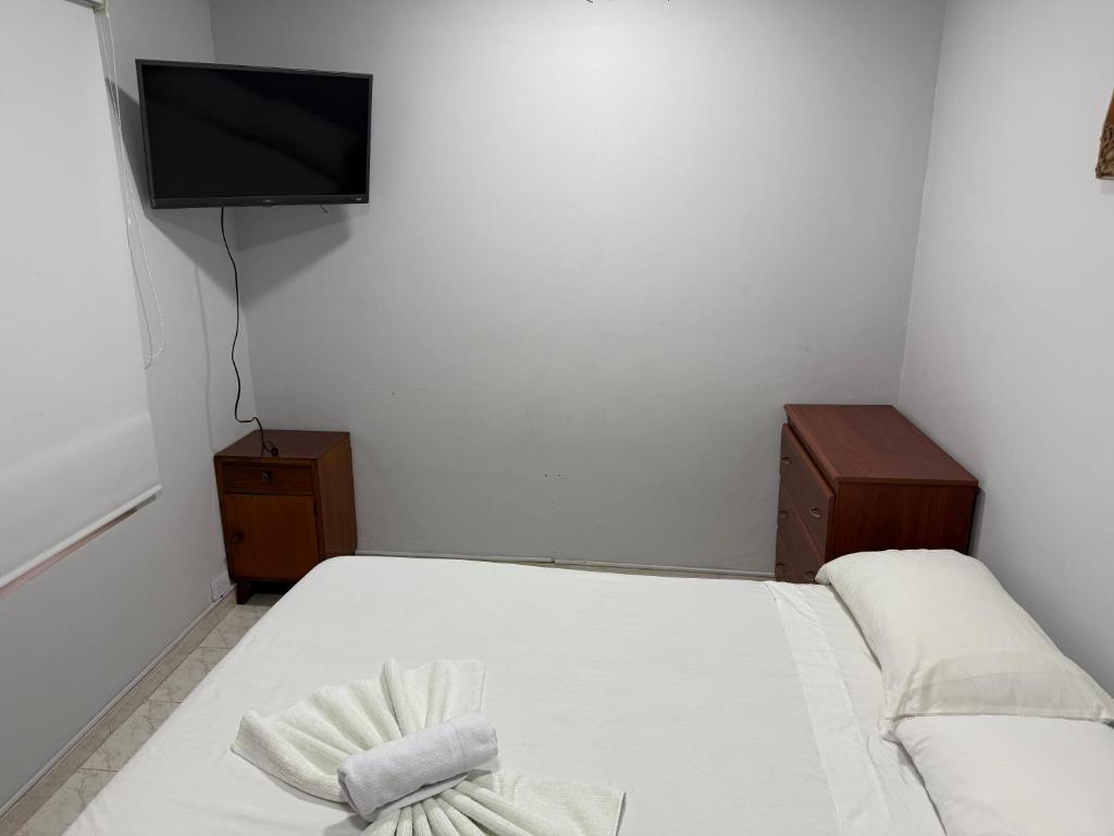Postel nebo postele na pokoji v ubytování Casa hotel la 33