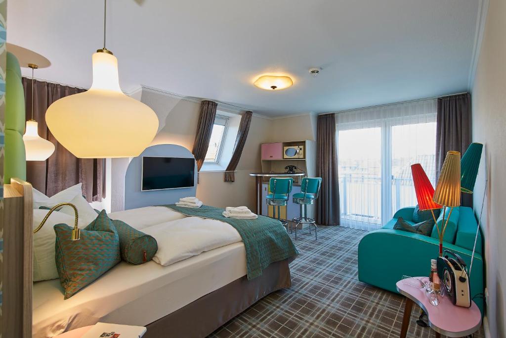 Postel nebo postele na pokoji v ubytování Bernstein Hotel "50`s Seaside Motel"