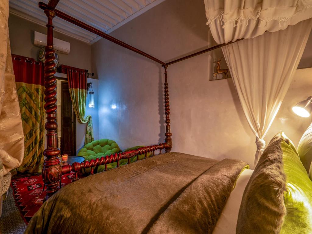 Postel nebo postele na pokoji v ubytování Riad Ines Home