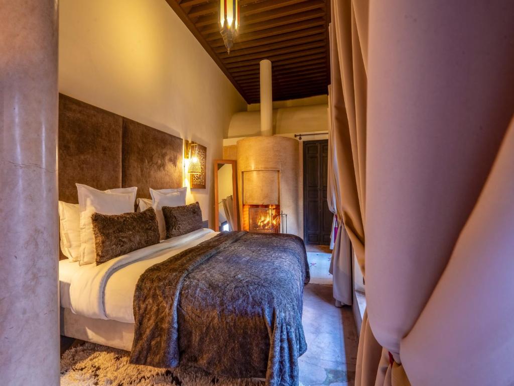 Postel nebo postele na pokoji v ubytování Riad Ines Home