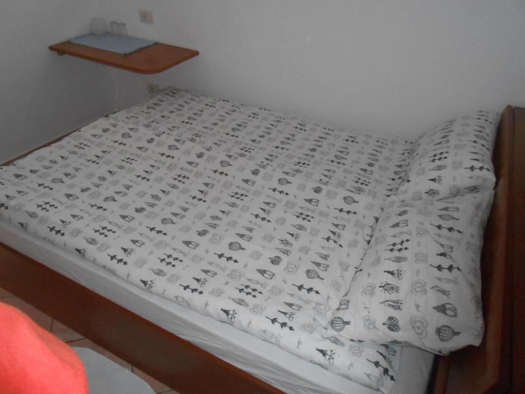 Postel nebo postele na pokoji v ubytování Love 2 Solkan