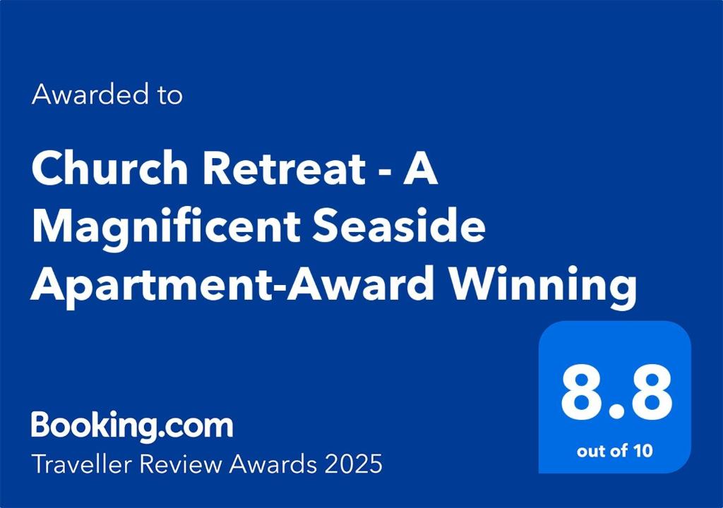 a blue sign that readsstudent retreat a magnificent senate appointment award winning at Church Retreat - A Magnificent Seaside Apartment-Award Winning in Hastings