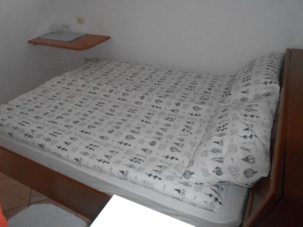 Postel nebo postele na pokoji v ubytování Love 2 Solkan