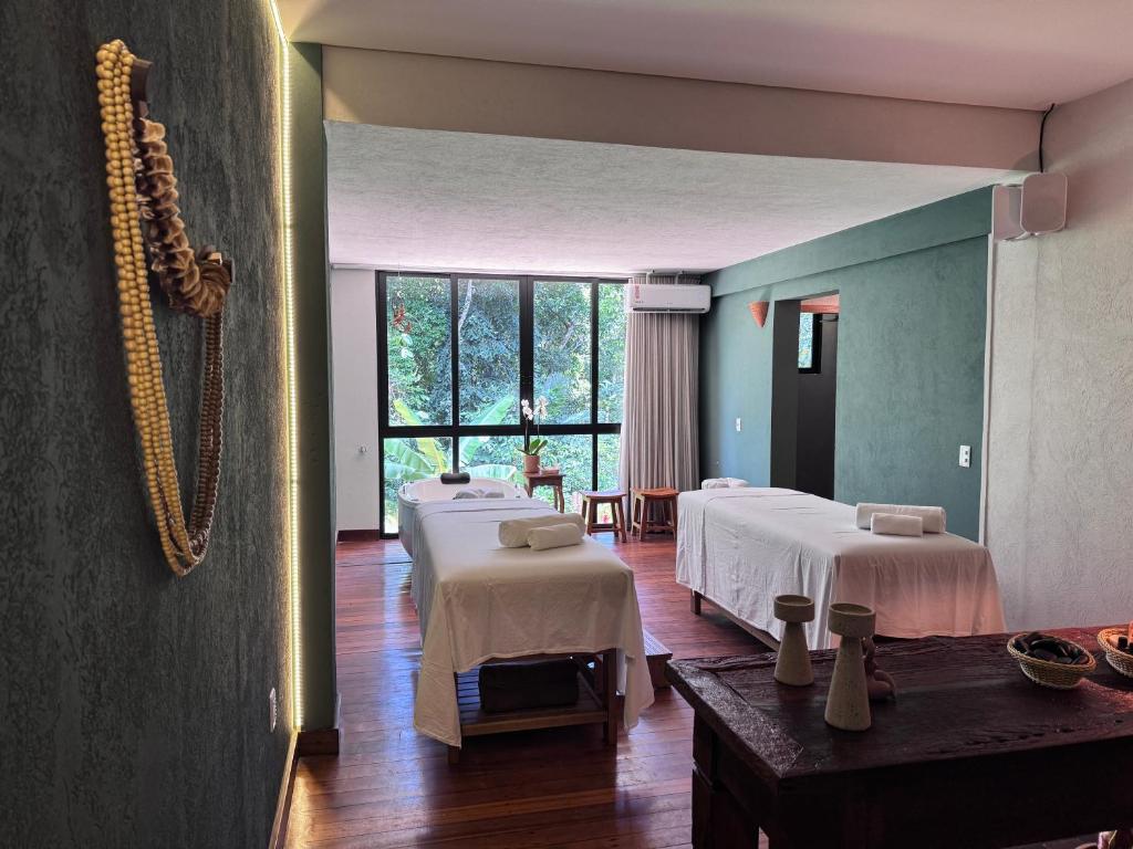 Postel nebo postele na pokoji v ubytování Aysú Trancoso Boutique Hotel