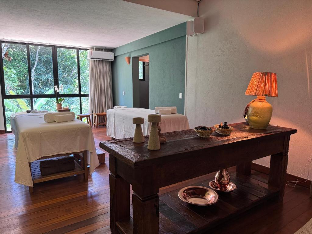 Postel nebo postele na pokoji v ubytování Aysú Trancoso Boutique Hotel