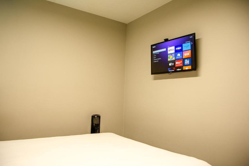 TV a/nebo společenská místnost v ubytování SkyHub