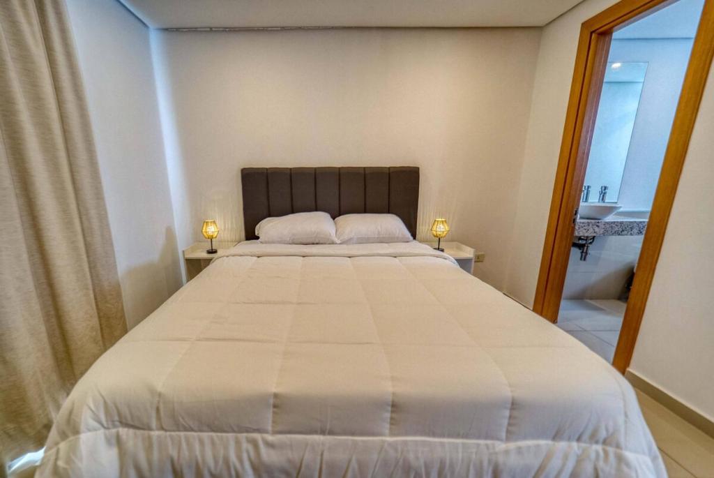 Postel nebo postele na pokoji v ubytování Vivelite ME 31