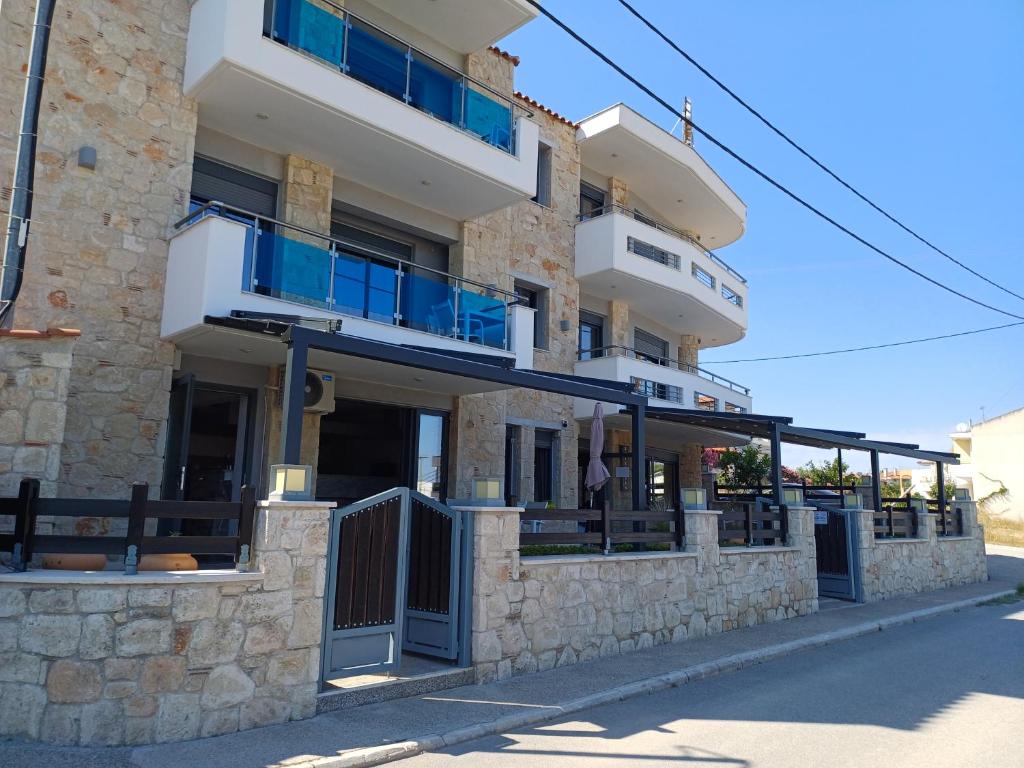 a building with balconies on the side of it at ANASTASIA ELENI in Kallithea Halkidikis