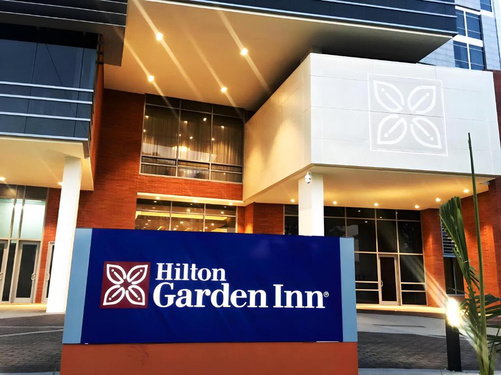 a building with a hilinson garden inn sign in front of it at Hilton Garden Inn Bogota Airport in Bogotá