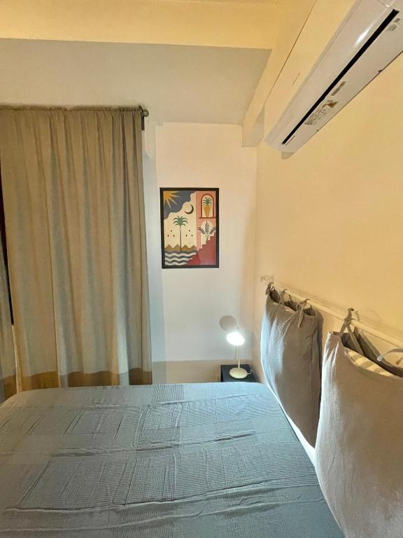 Postel nebo postele na pokoji v ubytování CAMPARY Casa Vacanze