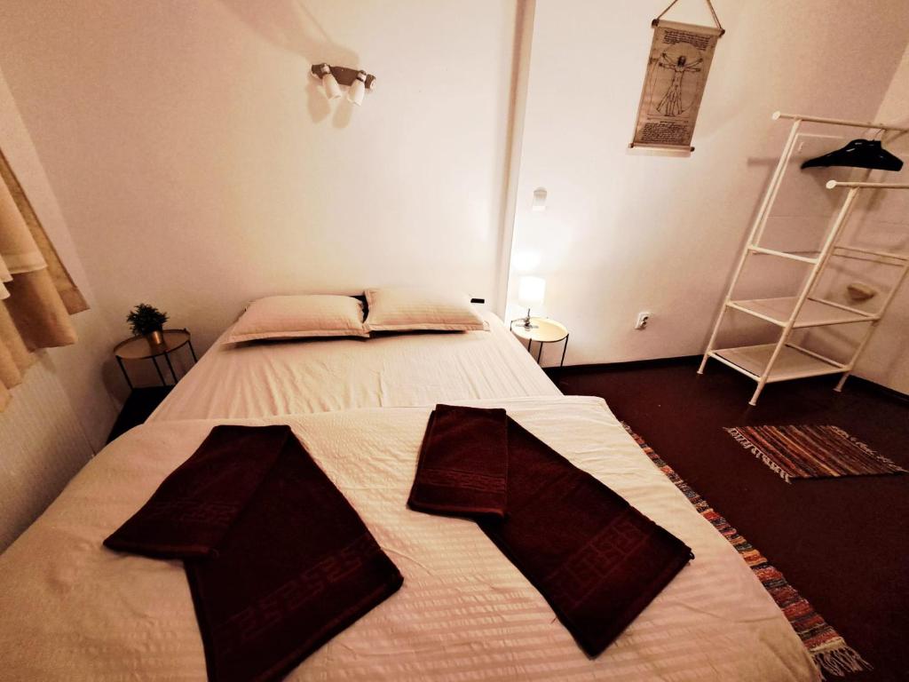 Postel nebo postele na pokoji v ubytování Studio Piata Amzei