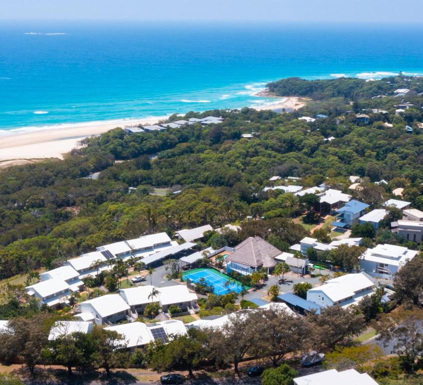 an aerial view of a resort and the beach at Pandanus Palms Ocean View Holiday Resort on Point Lookout in Point Lookout