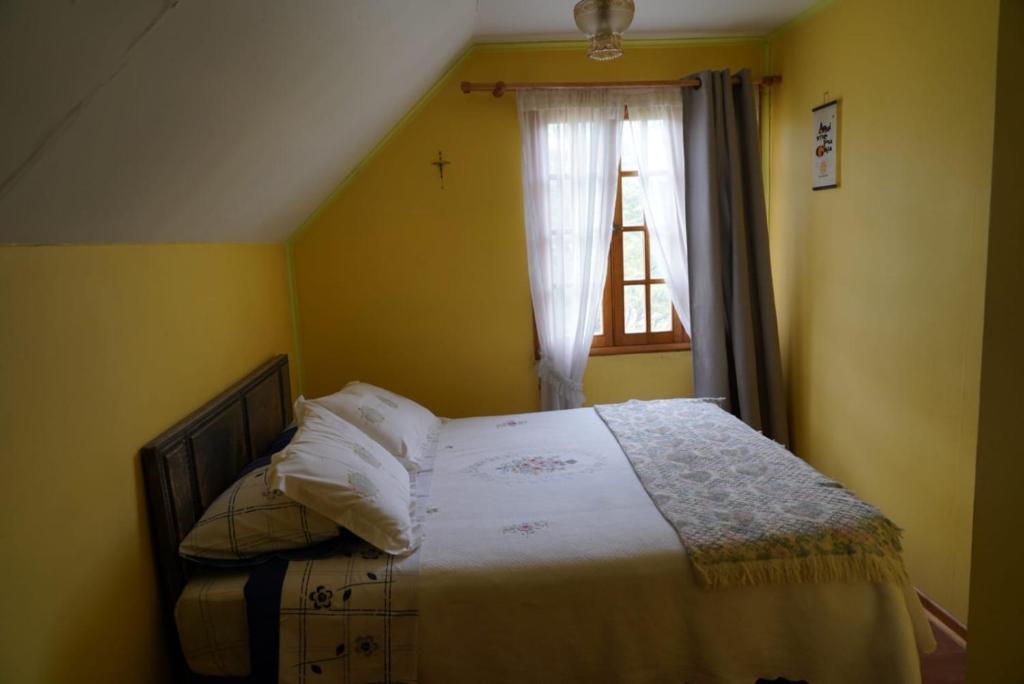 Postel nebo postele na pokoji v ubytování Hospedaje BoppHouse