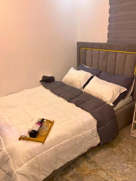 Postel nebo postele na pokoji v ubytování Pryme Apartment
