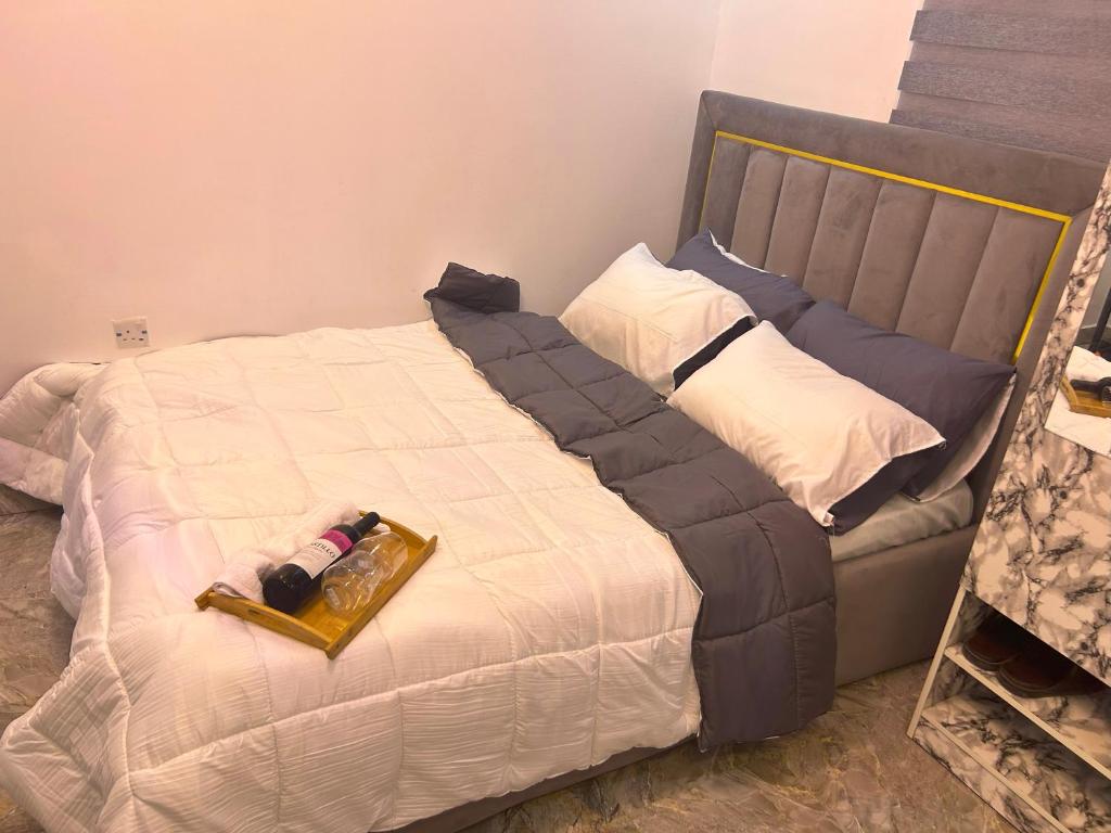 Postel nebo postele na pokoji v ubytování Pryme Apartment
