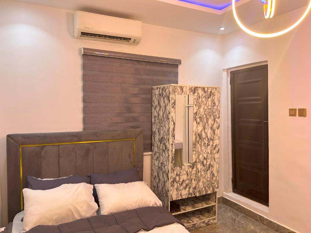 Postel nebo postele na pokoji v ubytování Pryme Apartment