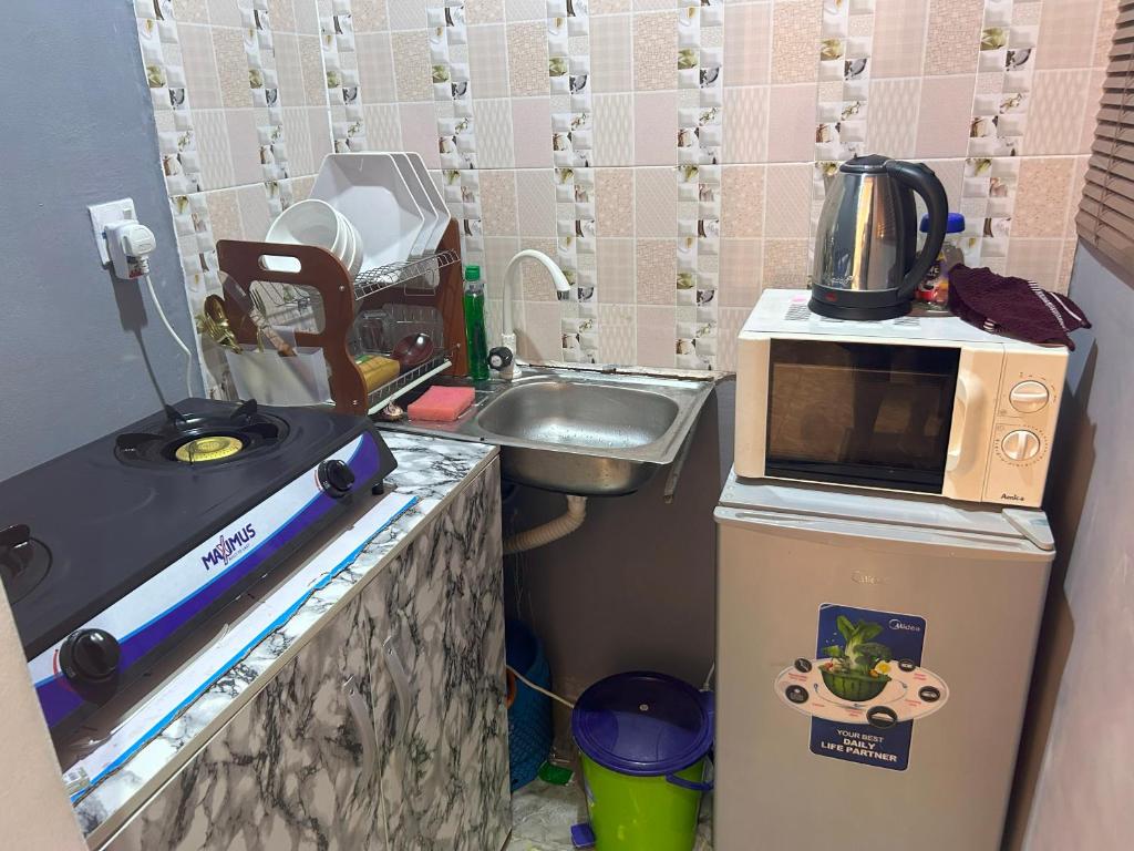 Kuchyň nebo kuchyňský kout v ubytování Pryme Apartment