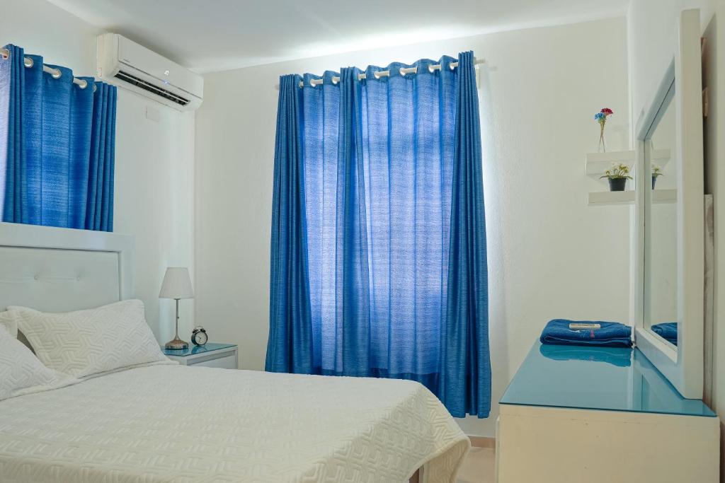 Postel nebo postele na pokoji v ubytování Ria Hotel