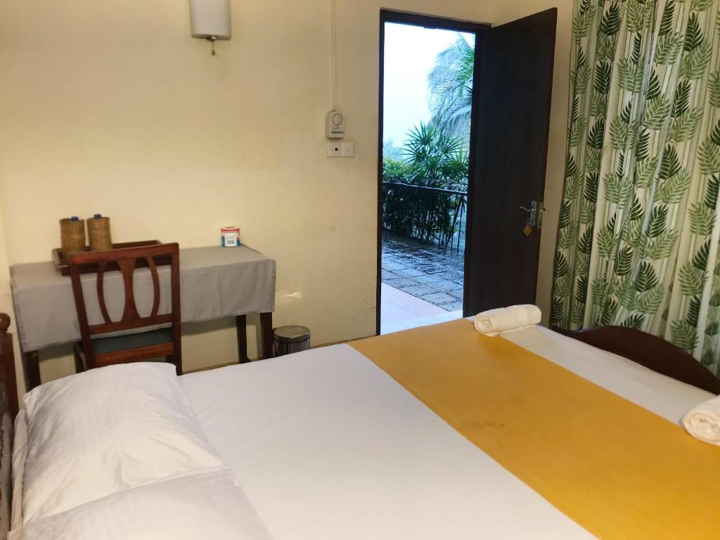 Postel nebo postele na pokoji v ubytování Nature Resort Layathraa