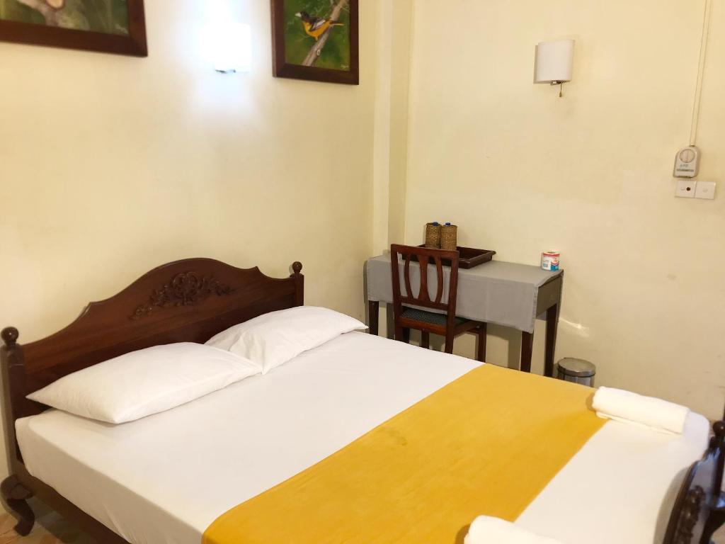 Postel nebo postele na pokoji v ubytování Nature Resort Layathraa