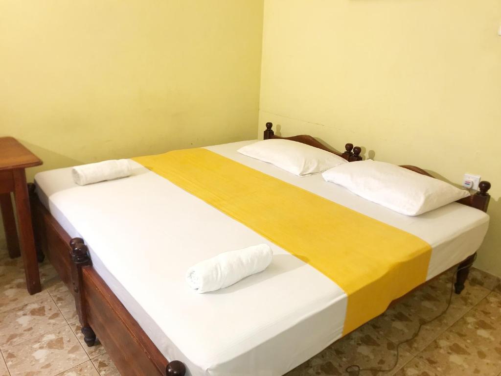Postel nebo postele na pokoji v ubytování Nature Resort Layathraa