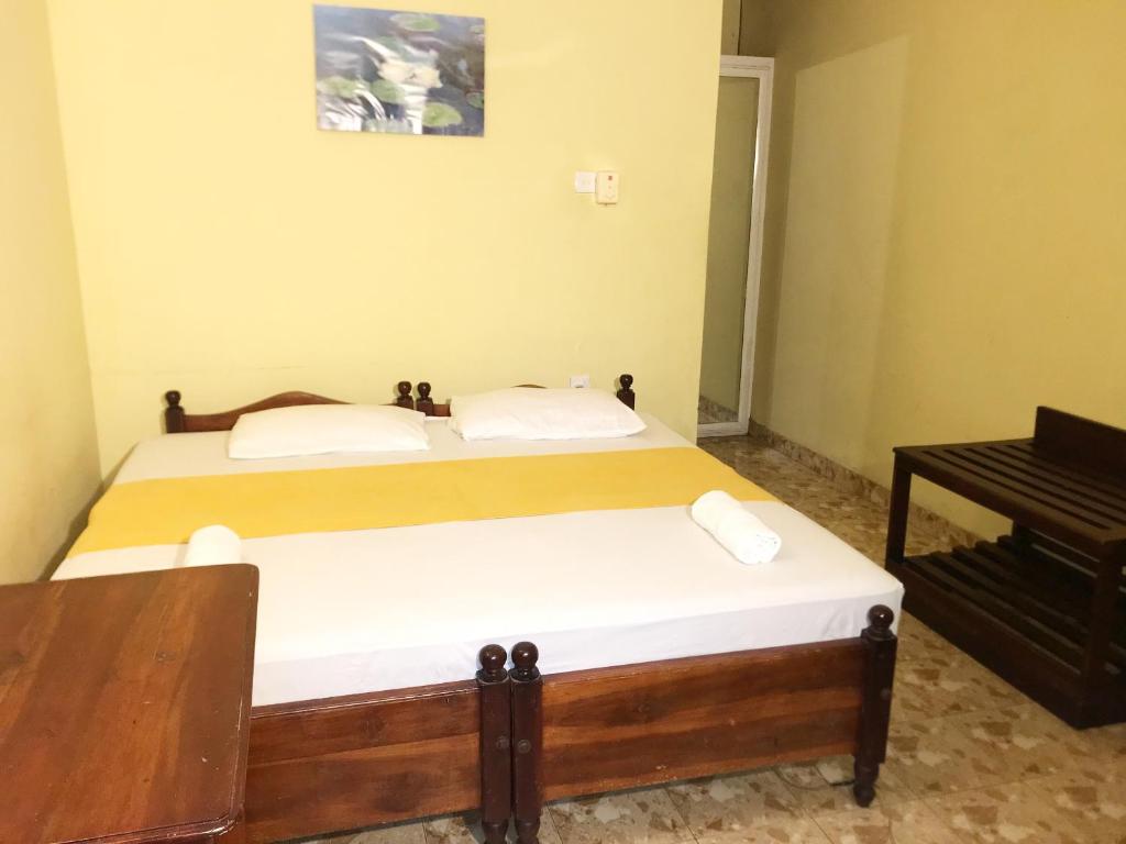 Postel nebo postele na pokoji v ubytování Nature Resort Layathraa