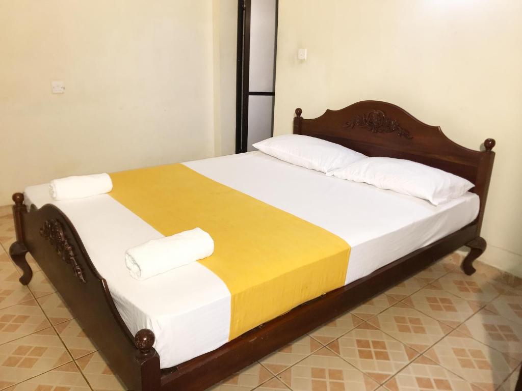 Postel nebo postele na pokoji v ubytování Nature Resort Layathraa