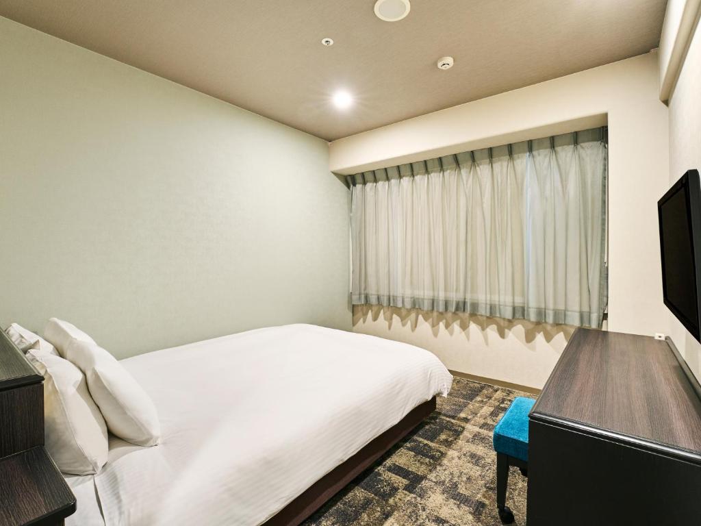 TV a/nebo společenská místnost v ubytování Hotel Elcient Kyoto Hachijoguchi