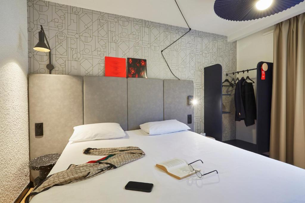 Postel nebo postele na pokoji v ubytování Ibis Sallanches Porte du MontBlanc