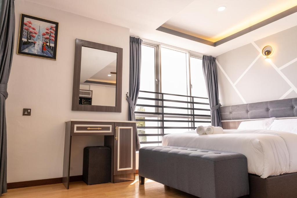 Rúm í herbergi á Sunrisestay
