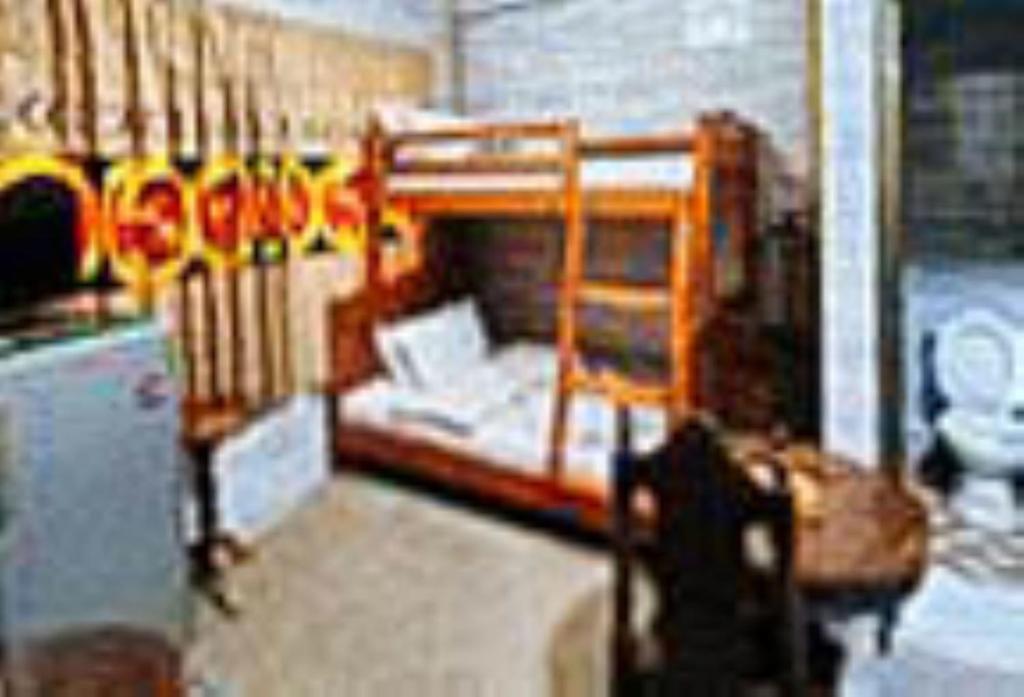 Postel nebo postele na pokoji v ubytování RedDoorz Hostel @ Faes Transient House