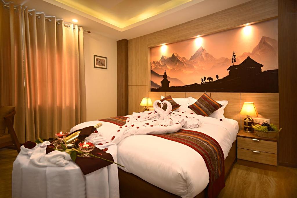 Postel nebo postele na pokoji v ubytování Hotel Sherpani