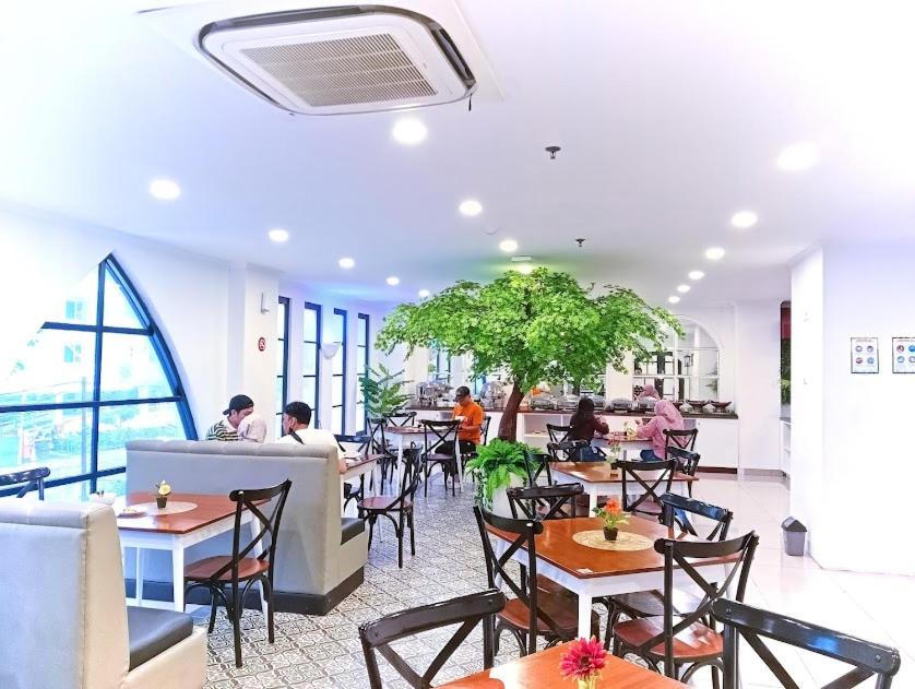 Posezení v ubytování Dafam Enkadeli Thamrin Jakarta Syariah