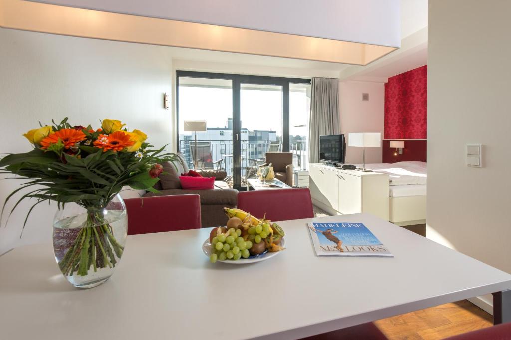 TV a/nebo společenská místnost v ubytování Carat Apartments Grömitz