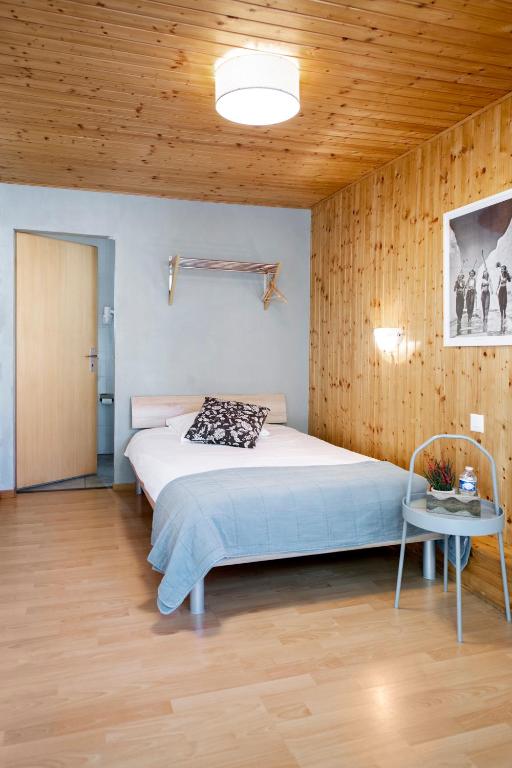 Postel nebo postele na pokoji v ubytování Motel-Restaurant 13 Etoiles
