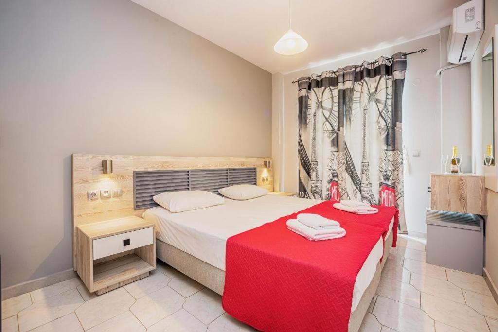 Posteľ alebo postele v izbe v ubytovaní Maritina Apartments