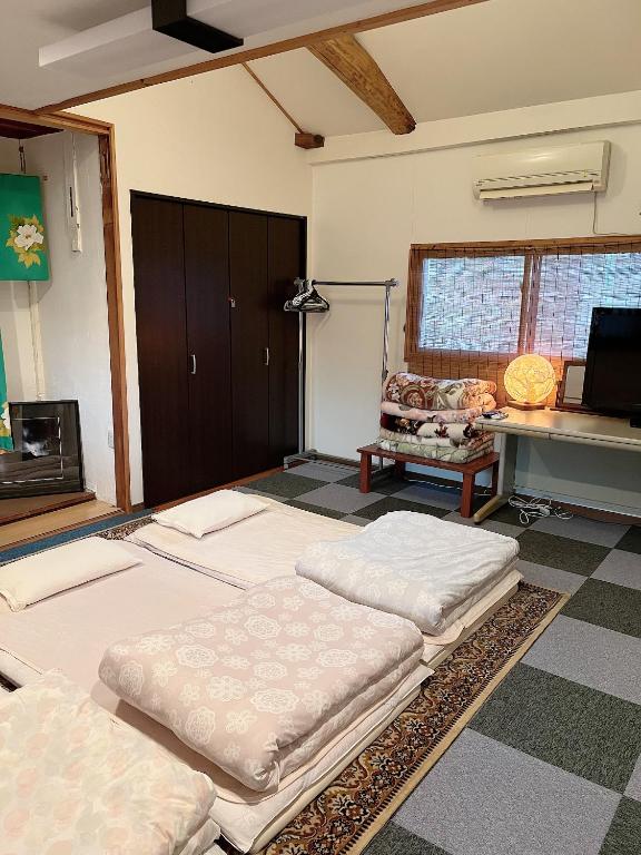 Voodi või voodid majutusasutuse Guesthouse Hope toas