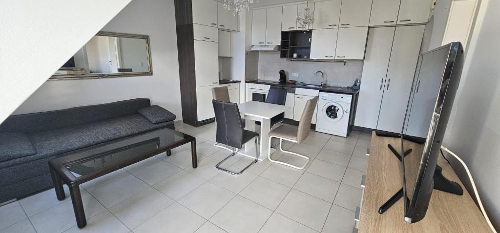 Kuchyň nebo kuchyňský kout v ubytování Vienna Airport Residences