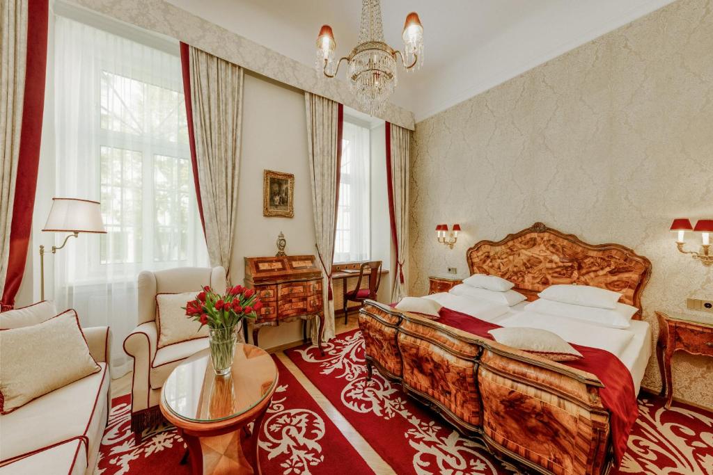 Posteľ alebo postele v izbe v ubytovaní Hotel Stefanie - VIENNA'S OLDEST HOTEL