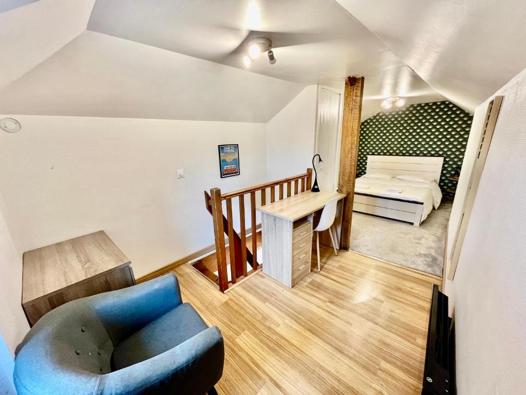 Ένα ή περισσότερα κρεβάτια σε δωμάτιο στο Duplex à 5 min de la gare-DABNB