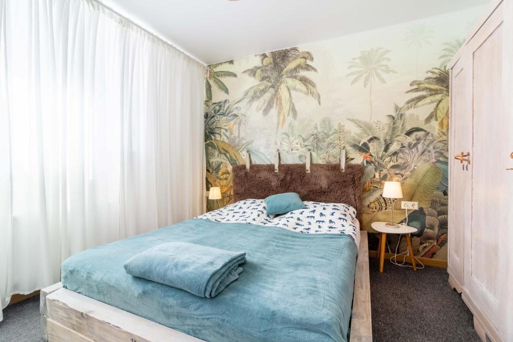 Giường trong phòng chung tại City Center Studio W-Parking and Terrace, By Cohost