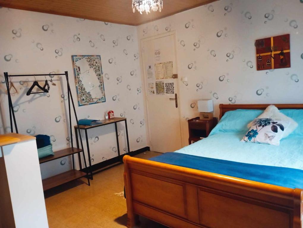 Postel nebo postele na pokoji v ubytování Le Clos du Cèdre